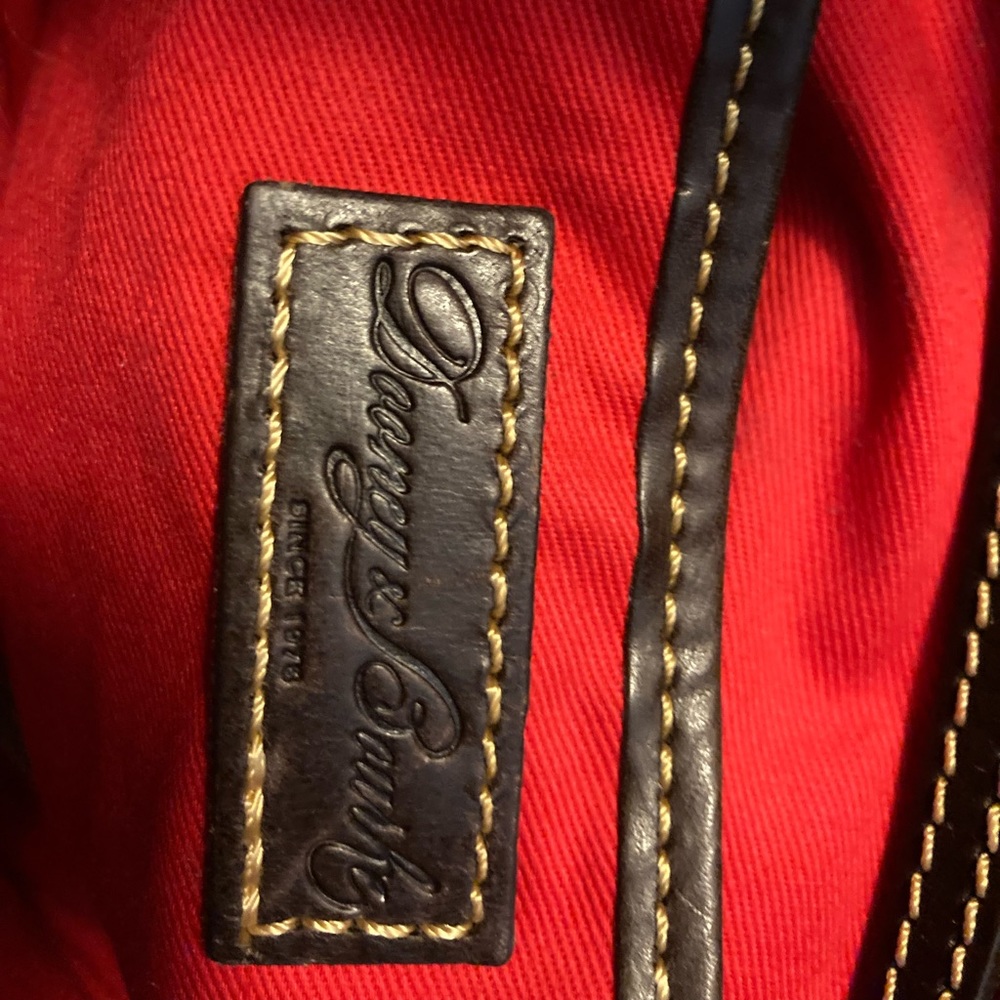Rich brown leather Dooney and Bourke satchel